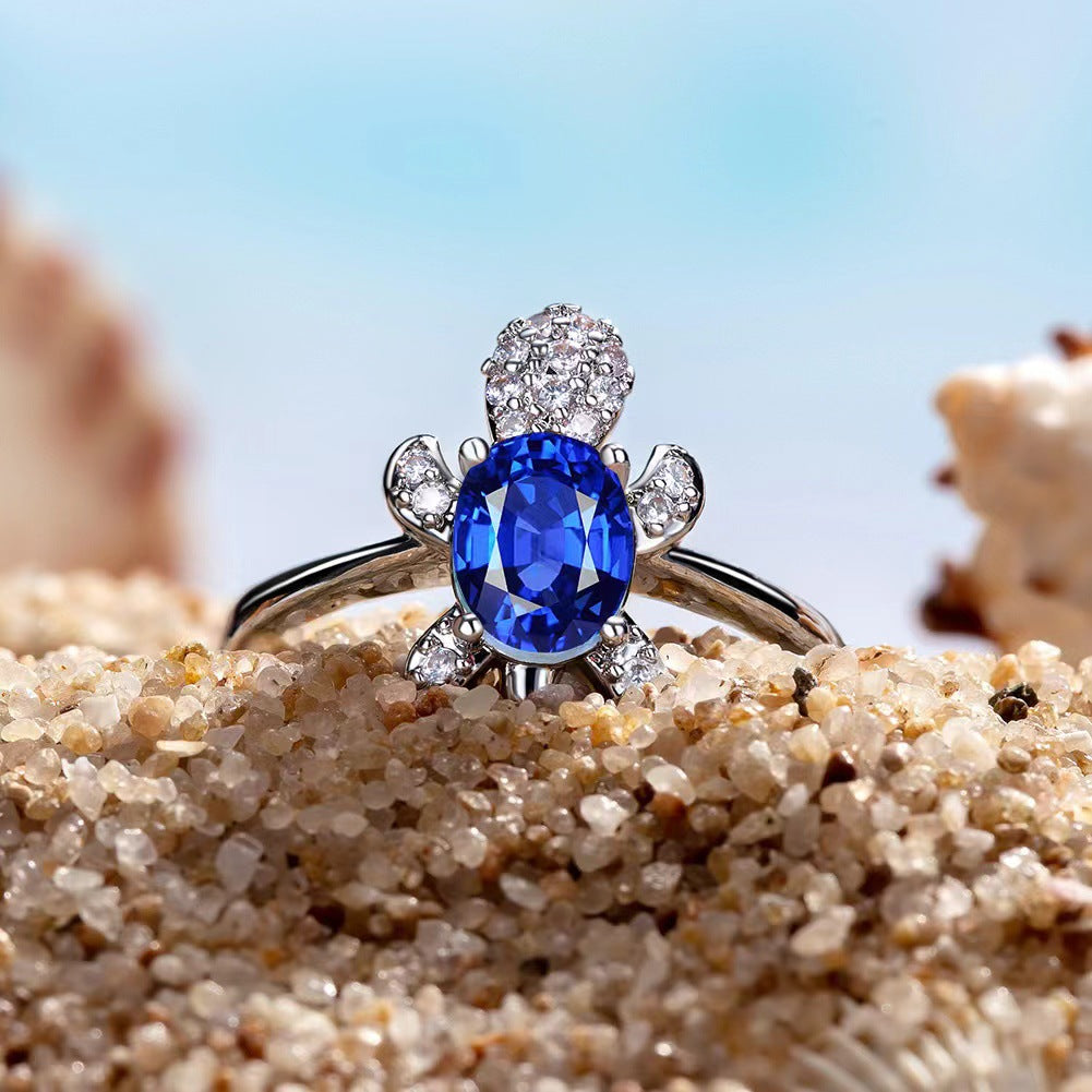 Platinum Ring With A Colored Tortoise Design Featuring Blue Diamondsunisex